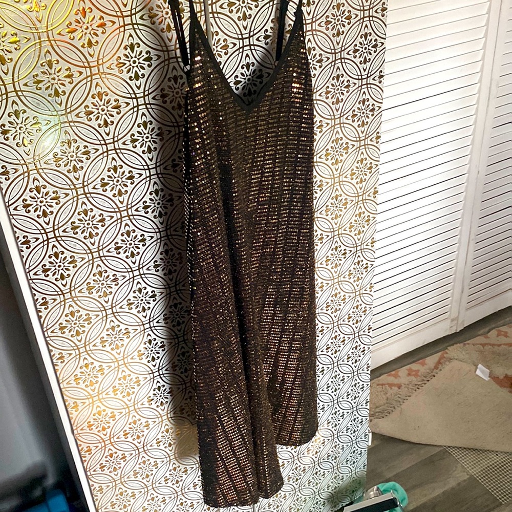 Discreet gold sequin spaghetti strap dress